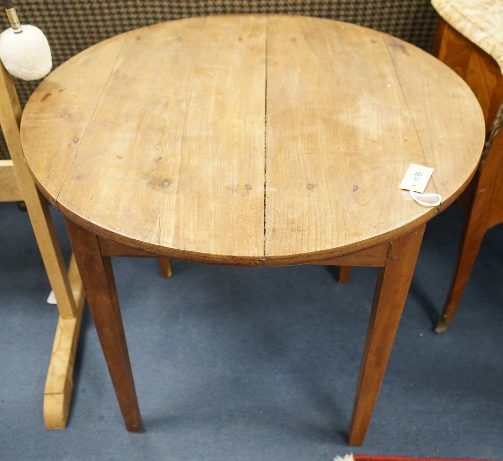 A 19th century French provincial circular cherry tea table, diameter 81cm, height 72cm